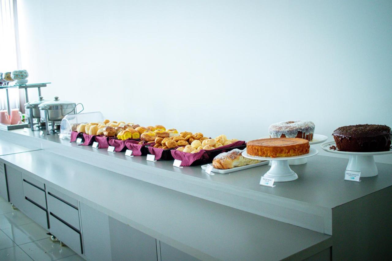 Hotel H2 Congonhas Extérieur photo A selection of cakes