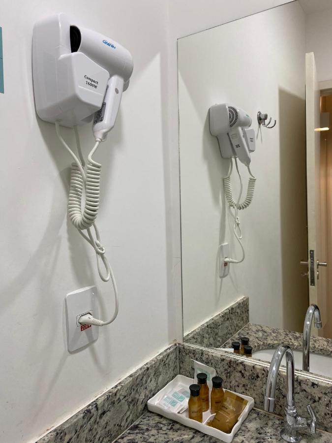 Hotel H2 Congonhas Extérieur photo A hair dryer in a hotel room